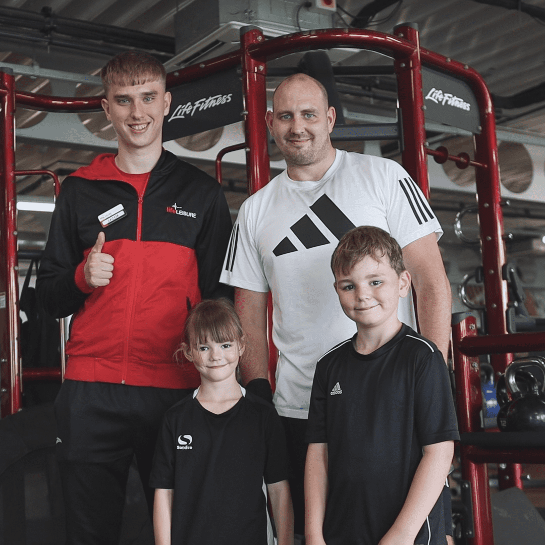 A family taking part in the family gym session at Stockport Sports Village